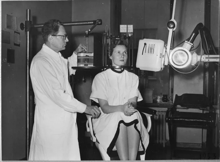 Dr. Yrjo Paatero with patient